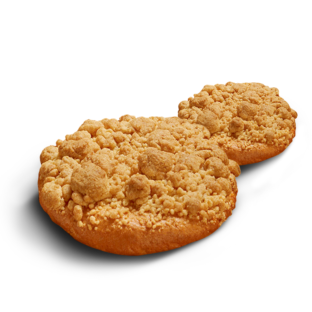 Zwei runde, goldgelbe glutenfreie Streuseltaler mit vielen dicken Streuseln obendrauf