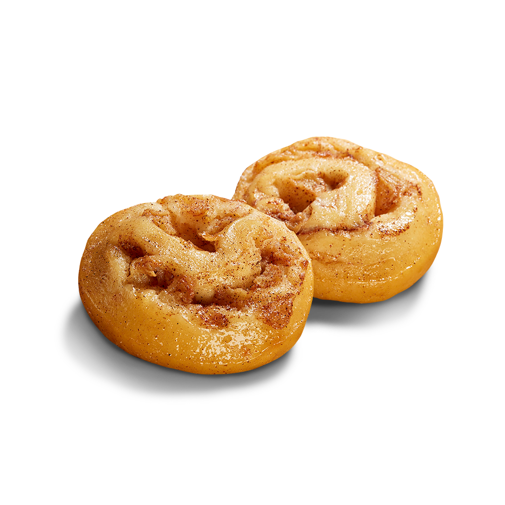 Zwei runde glutenfreie Poensgen Apfelberliner mit Äpfeln und Zimt